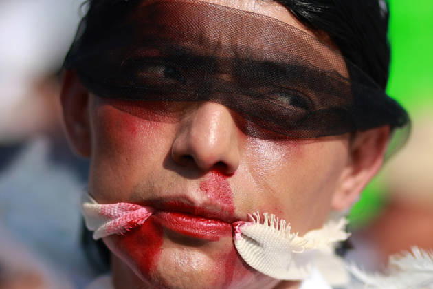 Thousands of healthcare workers hold national protest in Mexico City MEXICO CITY, MEXICO - OCTOBER 13: A woman takes part in a national protest march demanding wage increases for healthcare workers and more medical supplies for Mexico s public health system, in Mexico City, Mexico on October 13, 2026. Thousands of members of the Mexican Social Security Institute (IMSS) marched to demand higher wages, improved working conditions, and action to address nationwide shortages of basic medicines and supplies across public hospitals. Daniel Cardenas Anadolu Mexico City Mexico. Editorial use only. Please get in touch for any other usage.  Copyright: x2026xAnadoluxDanielxCardenasx