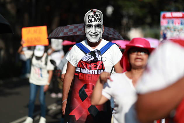 Thousands of healthcare workers hold national protest in Mexico City MEXICO CITY, MEXICO - OCTOBER 13: People take part in a national protest march demanding wage increases for healthcare workers and more medical supplies for Mexico s public health system, in Mexico City, Mexico on October 13, 2026. Thousands of members of the Mexican Social Security Institute (IMSS) marched to demand higher wages, improved working conditions, and action to address nationwide shortages of basic medicines and supplies across public hospitals. Daniel Cardenas Anadolu Mexico City Mexico. Editorial use only. Please get in touch for any other usage.  Copyright: x2026xAnadoluxDanielxCardenasx