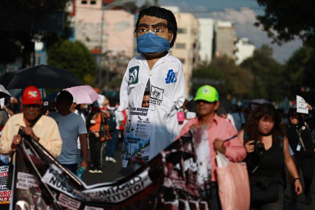 Thousands of healthcare workers hold national protest in Mexico City MEXICO CITY, MEXICO - OCTOBER 13: A healthcare worker mascot is seen during a national protest march demanding wage increases for healthcare workers and more medical supplies for Mexico s public health system, in Mexico City, Mexico on October 13, 2026. Thousands of members of the Mexican Social Security Institute (IMSS) marched to demand higher wages, improved working conditions, and action to address nationwide shortages of basic medicines and supplies across public hospitals. Daniel Cardenas Anadolu Mexico City Mexico. Editorial use only. Please get in touch for any other usage.  Copyright: x2026xAnadoluxDanielxCardenasx
