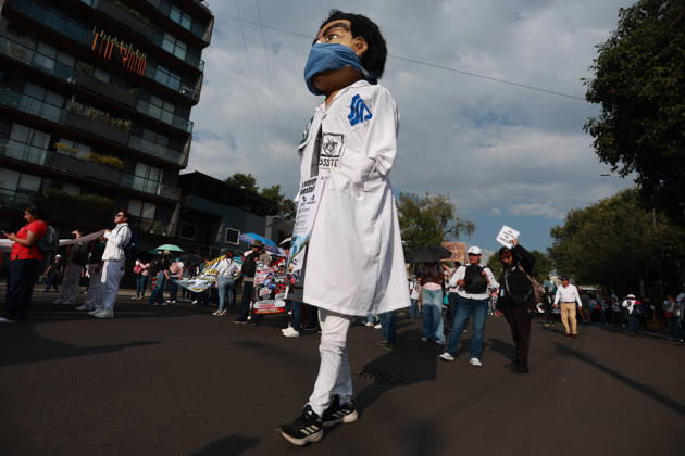 Thousands of healthcare workers hold national protest in Mexico City MEXICO CITY, MEXICO - OCTOBER 13: A healthcare worker mascot is seen during a national protest march demanding wage increases for healthcare workers and more medical supplies for Mexico s public health system, in Mexico City, Mexico on October 13, 2026. Thousands of members of the Mexican Social Security Institute (IMSS) marched to demand higher wages, improved working conditions, and action to address nationwide shortages of basic medicines and supplies across public hospitals. Daniel Cardenas Anadolu Mexico City Mexico. Editorial use only. Please get in touch for any other usage.  Copyright: x2026xAnadoluxDanielxCardenasx