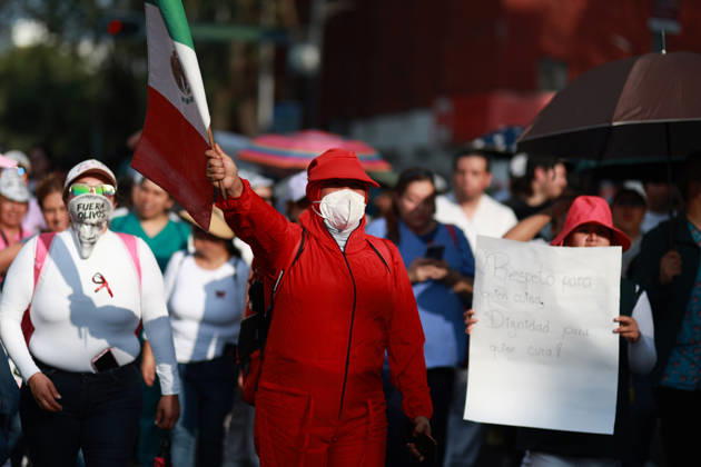 Thousands of healthcare workers hold national protest in Mexico City MEXICO CITY, MEXICO - OCTOBER 13: People take part in a national protest march demanding wage increases for healthcare workers and more medical supplies for Mexico s public health system, in Mexico City, Mexico on October 13, 2026. Thousands of members of the Mexican Social Security Institute (IMSS) marched to demand higher wages, improved working conditions, and action to address nationwide shortages of basic medicines and supplies across public hospitals. Daniel Cardenas Anadolu Mexico City Mexico. Editorial use only. Please get in touch for any other usage.  Copyright: x2026xAnadoluxDanielxCardenasx