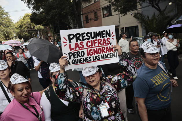 October 13, 2026, Mexico City, Cdmx, Mexico: Thousands of medical and healthcare workers from the Mexican Social Security Institute (IMSS) are staging a massive nationwide protest. In Mexico City, demonstrations are taking place at headquarters and hospitals, with the main march heading toward the union s offices; the march began at the government-run Siglo XXI Hospital which relies on federal funding and serves employees from various Mexican government agencies. The protest stems from workers demands for better working conditions, specifically addressing excessive workloads, unfilled vacancies across all departments, and the need for proper maintenance of clinical and hospital facilities as well as workplace safety standards. Other dema - ZUMAp204 20261013_zip_p204_044 Copyright: xJosuexPerezx
