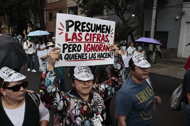 October 13, 2026, Mexico City, Cdmx, Mexico: Thousands of medical and healthcare workers from the Mexican Social Security Institute (IMSS) are staging a massive nationwide protest. In Mexico City, demonstrations are taking place at headquarters and hospitals, with the main march heading toward the union s offices; the march began at the government-run Siglo XXI Hospital which relies on federal funding and serves employees from various Mexican government agencies. The protest stems from workers demands for better working conditions, specifically addressing excessive workloads, unfilled vacancies across all departments, and the need for proper maintenance of clinical and hospital facilities as well as workplace safety standards. Other dema - ZUMAp204 20261013_zip_p204_045 Copyright: xJosuexPerezx