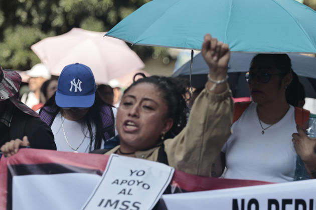 October 13, 2026, Mexico City, Cdmx, Mexico: Thousands of medical and healthcare workers from the Mexican Social Security Institute (IMSS) are staging a massive nationwide protest. In Mexico City, demonstrations are taking place at headquarters and hospitals, with the main march heading toward the union s offices; the march began at the government-run Siglo XXI Hospital which relies on federal funding and serves employees from various Mexican government agencies. The protest stems from workers demands for better working conditions, specifically addressing excessive workloads, unfilled vacancies across all departments, and the need for proper maintenance of clinical and hospital facilities as well as workplace safety standards. Other dema - ZUMAp204 20261013_zip_p204_047 Copyright: xJosuexPerezx