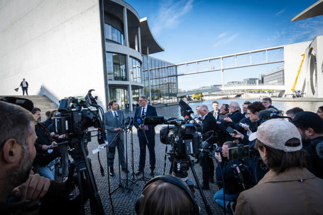 Lars Klingbeil, SPD Party Chairman and Federal Minister of Finance, and Alexander Schweitzer, Federal Minister of Labor-designate, at Friedrich-Ebert-Platz in front of the Bundestag building; introduction of the new Federal Minister of Labor on the day of his swearing-in by the SPD Party Chairman, Berlin, Berlin, Germany, Friedrich-Ebert-Platz
