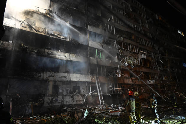 Ballistic missile strikes next to nine-story residential building in Desnianskyi district of Kyiv Rescuers extinguish a fire that broke out following a Russian missile strike on a nine-story residential building in Kyiv’s Desnianskyi district, Ukraine, on October 14, 2026. Russia launched a massive ballistic missile attack on the capital. Three women were killed and 19 people were injured in the Desnianskyi district, including a seven-year-old girl. Apartments on the first through eighth floors of the building were also damaged, Credit:Oleksandr Klymenko Ukrinform Avalon Ukraine, Kyiv  Copyright: xOleksandrxKlymenkox xUkrinformx xAvalonx 1143212077