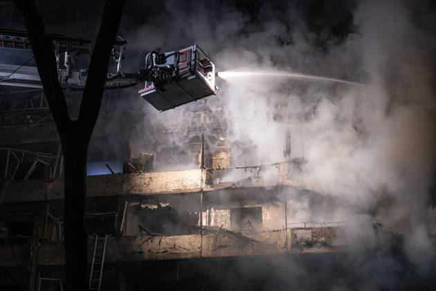 Ballistic missile strikes next to nine-story residential building in Desnianskyi district of Kyiv A rescuer on an aerial platform extinguishes a fire that broke out following a Russian missile strike on a nine-story residential building in Kyiv’s Desnianskyi district, Ukraine, on October 14, 2026. Russia launched a massive ballistic missile attack on the capital. Three women were killed and 19 other people were injured in the Desnianskyi district, including a seven-year-old girl. Apartments in the nine-story building were also damaged from the first through the eighth floor, Credit:Danylo Antoniuk Ukrinform Avalon Ukraine, Kyiv  Copyright: xDanyloxAntoniukx xUkrinformx xAvalonx 1143212295