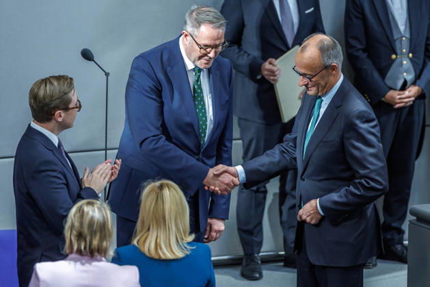 Bundestag: Federal Chancellor Friedrich Merz (CDU) and Alexander Schweitzer (SPD), Federal Minister of Labor and Social Affairs, after being sworn in at the German Bundestag on October 10, 26, in Berlin, Berlin, Berlin, Germany, Bundestag