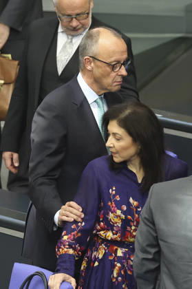 Friedrich Merz and Katherina Reiche at the session of the German Bundestag on October 14, 2026, in Berlin; Chancellor Merz delivering the government statement to the German Bundestag