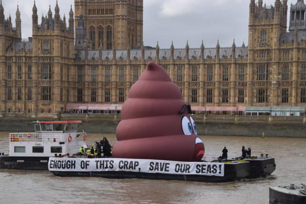 October 14, 2026, London, England, United Kingdom: Campaigners inflate a giant ˜poo™ on the River Thames outside the Parliament, calling on the UK government to act on sewage pollution. London United Kingdom - ZUMAv130 20261014_zip_v130_006 Copyright: xVukxValcicx