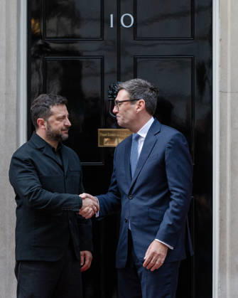 October 14, 2026, London, England, United Kingdom: British Prime Minister Andy BURNHAM shakes hands with Ukrainian President Volodymyr ZELENSKYY outside 10 Downing Street in London, United Kingdom, ahead of talks on the UK s continued support for Ukraine. London United Kingdom  - ZUMAk172 20261014_zip_k172_084 Copyright: xThomasxKrychx