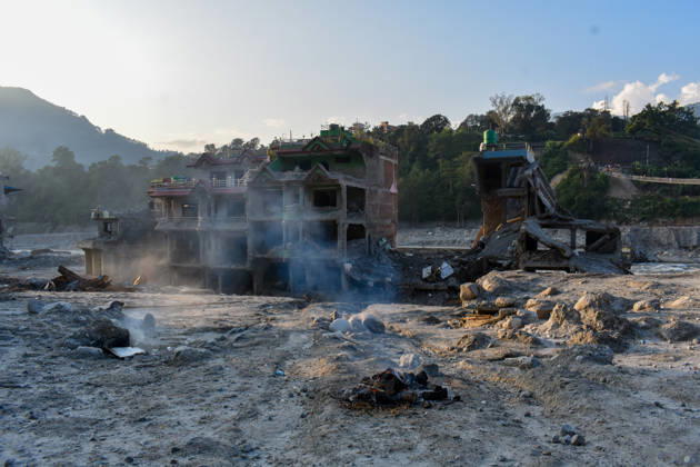 Aftermath of flash floods in Nepal NUWAKOT, NEPAL - OCTOBER 14 : Houses damaged by devastating flash floods are seen in Trishuli, Nuwakot district, Nepal on October 14, 2026. Road and pedestrian connectivity has been restored with the construction of a new suspension bridge over the Trishuli River, allowing local residents to cross the river after the devastating floods damaged bridges and other infrastructure in the area. Sunil Pradhan Anadolu Nuwakot Nepal. Editorial use only. Please get in touch for any other usage.  Copyright: x2026xAnadoluxSunilxPradhanx