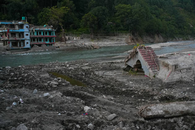 Aftermath of flash floods in Nepal NUWAKOT, NEPAL - OCTOBER 14 : Houses damaged by devastating flash floods are seen in Betrabati, Nuwakot district, Nepal on October 14, 2026. Road and pedestrian connectivity has been restored with the construction of a new suspension bridge over the Trishuli River, allowing local residents to cross the river after the devastating floods damaged bridges and other infrastructure in the area. Sunil Pradhan Anadolu Nuwakot Nepal. Editorial use only. Please get in touch for any other usage.  Copyright: x2026xAnadoluxSunilxPradhanx