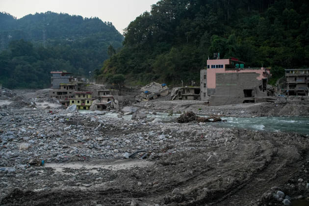 Aftermath of flash floods in Nepal RASUWA, NEPAL - OCTOBER 14 : Houses damaged by devastating flash floods are seen in Rasuwa district, Nepal on October 14, 2026. Road and pedestrian connectivity has been restored with the construction of a new suspension bridge over the Trishuli River, allowing local residents to cross the river after the devastating floods damaged bridges and other infrastructure in the area. Sunil Pradhan Anadolu Rasuwa Nepal. Editorial use only. Please get in touch for any other usage.  Copyright: x2026xAnadoluxSunilxPradhanx