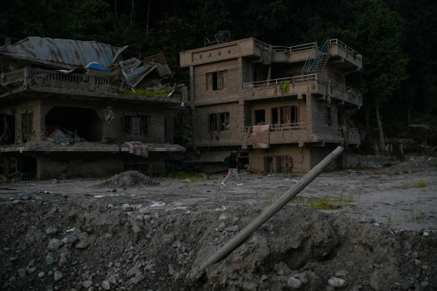 Aftermath of flash floods in Nepal RASUWA, NEPAL - OCTOBER 14 : Houses damaged by devastating flash floods are seen in Rasuwa dristrict, Nepal on October 14, 2026. Road and pedestrian connectivity has been restored with the construction of a new suspension bridge over the Trishuli River, allowing local residents to cross the river after the devastating floods damaged bridges and other infrastructure in the area. Sunil Pradhan Anadolu Rasuwa Nepal. Editorial use only. Please get in touch for any other usage.  Copyright: x2026xAnadoluxSunilxPradhanx