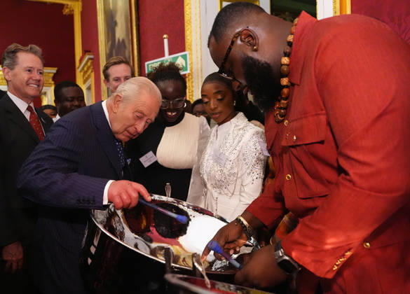 King Charles mattends a Commonmwealth Diaspora Reception King Charles tries his hand at playing a steelpan drum with Khan Cordice, during a reception to celebrate the Commonwealth Diaspora, at St James™s Palace, London, UK, on the 14th of October 2026. Picture by Aaron Chown WPA-Pool London St James™s Palace London UK  WHA-0831