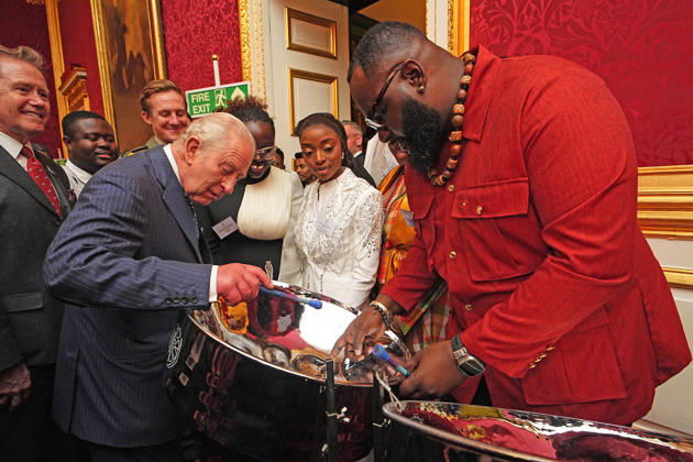 King Charles mattends a Commonmwealth Diaspora Reception King Charles tries his hand at playing a steelpan drum with Khan Cordice, during a reception to celebrate the Commonwealth Diaspora, at St James™s Palace, London, UK, on the 14th of October 2026. Picture by Aaron Chown WPA-Pool London St James™s Palace London UK  WHA-0831