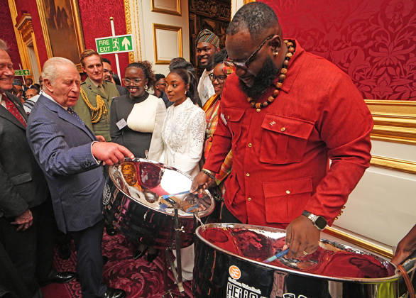 King Charles mattends a Commonmwealth Diaspora Reception King Charles tries his hand at playing a steelpan drum with Khan Cordice, during a reception to celebrate the Commonwealth Diaspora, at St James™s Palace, London, UK, on the 14th of October 2026. Picture by Aaron Chown WPA-Pool London St James™s Palace London UK  WHA-0831