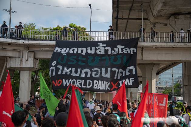 October 15, 2026, Bangkok, Thailand: BANGKOK, THAILAND, OCTOBER 15, 2026: Civil society activists march in Bangkok to protest against the World Bank and the International Monetary Fund during their 2026 Annual Meetings. Demonstrators carry banners and signs opposing the institutions as organisers seek police permission to demonstrate outside the Queen Sirikit National Convention Center. Bangkok Thailand - ZUMAq101 20261015_zna_q101_035 Copyright: xPanawatxSeangsotgx