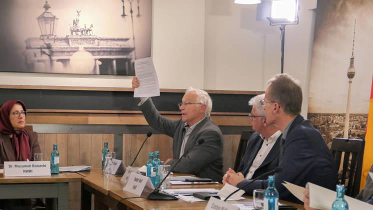 October 14, 2026, Berlin, Germany: Former German Bundestag Member, Martin Patzelt raises the open letter signed by 80 prominent German political and civic figures during his keynote speech. The conference, titled Iran in Crisis: The Democratic Solution and Germany s Responsibility, was organized by the German Solidarity Committee for a Free Iran (DSFI) and the Association of German-Iranians (GDI) at Hopfingerbräu am Brandenburger Tor in Berlin, Germany, on October 14, 2026. The conference brought together German federal lawmakers, former diplomats, and witnesses to discuss human rights, democratic prospects for Iran, and an open letter signed by 80 German dignitaries protesting the Friedrich Naumann Foundation s controversial plan to p  - ZUMAs197 20261014_aaa_s197_465 Copyright: xSiavoshxHosseinix