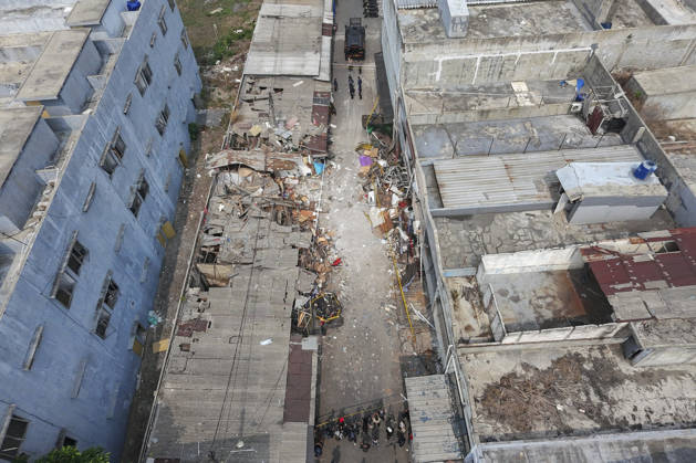 Blast at Indonesian market kills 2, injures 11 in South Tangerang BANTEN, INDONESIA - OCTOBER 15: An aerial view shows damaged shop-house buildings and debris scattered across the site of an explosion at a market in South Tangerang, on the outskirt of Jakarta, Indonesia, on October 15, 2026. The blast killed two people and injured at least 11 others, according to police. Investigators are examining the cause of the explosion after finding an ethylene gas cylinder at the site. The blast damaged shop-house buildings and scattered debris across the surrounding commercial area. Agoes Rudianto Anadolu Banten Indonesia. Editorial use only. Please get in touch for any other usage.  Copyright: x2026xAnadoluxAgoesxRudiantox