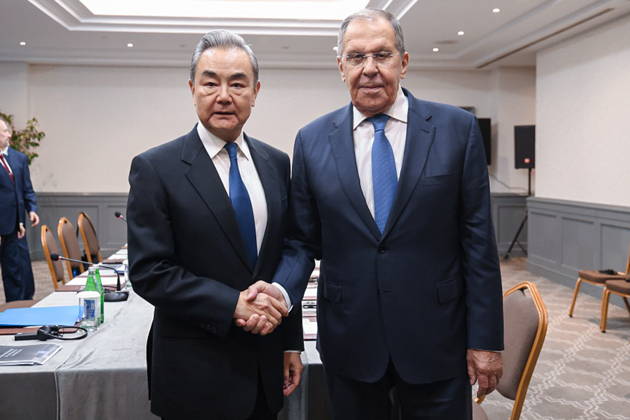 AZERBAIJAN, BAKU - OCTOBER 15, 2026: Russia s Foreign Minister Sergei Lavrov and his counterpart Wang Yi of China shake hands during a meeting held as part of the Conference on Interaction and Confidence-Building Measures in Asia (CICA) summit. Video screen grab. Best quality available Baku Azerbaijan  - ZUMAt113 20261015_zaa_t113_030 Copyright: xRussianxForeignxMinistryx