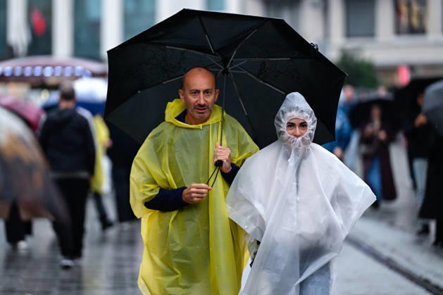 Rain affects daily life on Istanbul’s Istiklal Street ISTANBUL, TURKIYE - OCTOBER 15: People use umbrellas to shield themselves from intermittent rainfall on Istiklal Street in Istanbul, Turkiye, on October 15, 2026. Arif Hudaverdi Yaman Anadolu Istanbul Turkey. Editorial use only. Please get in touch for any other usage.  Copyright: x2026xAnadoluxArifxHudaverdixYamanx