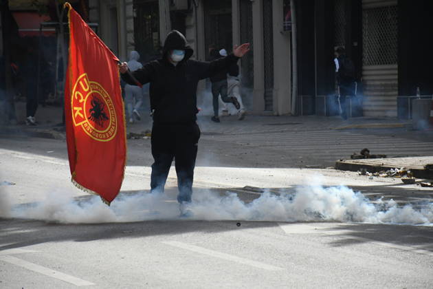 Student protests demanding improved educational conditions continue in Albania TIRANA, ALBANIA - OCTOBER 15: A masked protester stands amid clouds of tear gas during clashes with police on the third day of demonstrations demanding improved educational conditions in Tirana, Albania, on October 15, 2026. University students are joined by high school students and local residents as police use tear gas to disperse demonstrators outside the Ministry of Education and the Parliament building, while protesters throw stones and other objects at police officers. Olsi Shehu Anadolu Tirana Albania. Editorial use only. Please get in touch for any other usage.  Copyright: x2026xAnadoluxOlsixShehux