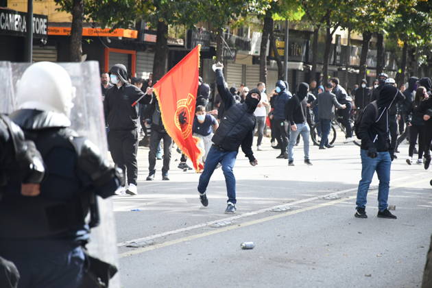 Student protests demanding improved educational conditions continue in Albania TIRANA, ALBANIA - OCTOBER 15: A masked protester throws an object toward riot police as demonstrators clash with security forces during the third day of protests demanding improved educational conditions in Tirana, Albania, on October 15, 2026. University students are joined by high school students and local residents as police use tear gas to disperse demonstrators outside the Ministry of Education and the Parliament building, while protesters throw stones and other objects at police officers. Olsi Shehu Anadolu Tirana Albania. Editorial use only. Please get in touch for any other usage.  Copyright: x2026xAnadoluxOlsixShehux