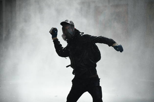 Student protests demanding improved educational conditions continue in Albania TIRANA, ALBANIA - OCTOBER 15: A protester, wearing a gas mask, moves through a cloud of water sprayed by a police water cannon during the third day of demonstrations demanding improved educational conditions in Tirana, Albania, on October 15, 2026. University students are joined by high school students and local residents as tensions escalate, with police using tear gas to disperse demonstrators outside the Ministry of Education and the Parliament building, while protesters throw stones and other objects at police officers. Olsi Shehu Anadolu Tirana Albania. Editorial use only. Please get in touch for any other usage.  Copyright: x2026xAnadoluxOlsixShehux
