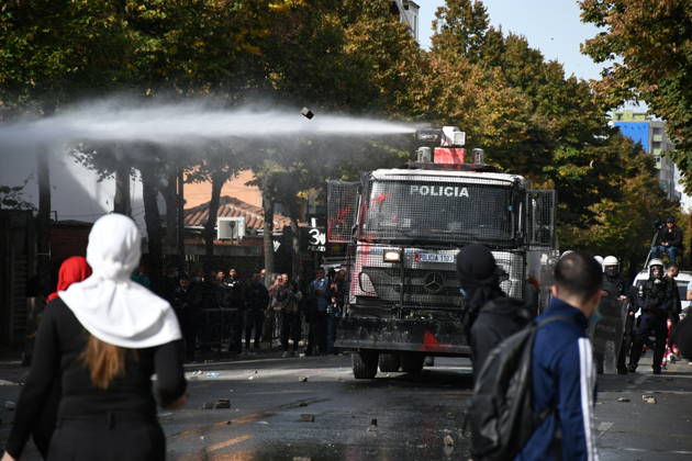 Student protests demanding improved educational conditions continue in Albania TIRANA, ALBANIA - OCTOBER 15: A police water cannon sprays water toward demonstrators during the third day of protests demanding improved educational conditions in Tirana, Albania, on October 15, 2026. University students are joined by high school students and local residents as tensions escalate, with police using tear gas to disperse demonstrators outside the Ministry of Education and the Parliament building, while protesters throw stones and other objects at police officers. Olsi Shehu Anadolu Tirana Albania. Editorial use only. Please get in touch for any other usage.  Copyright: x2026xAnadoluxOlsixShehux