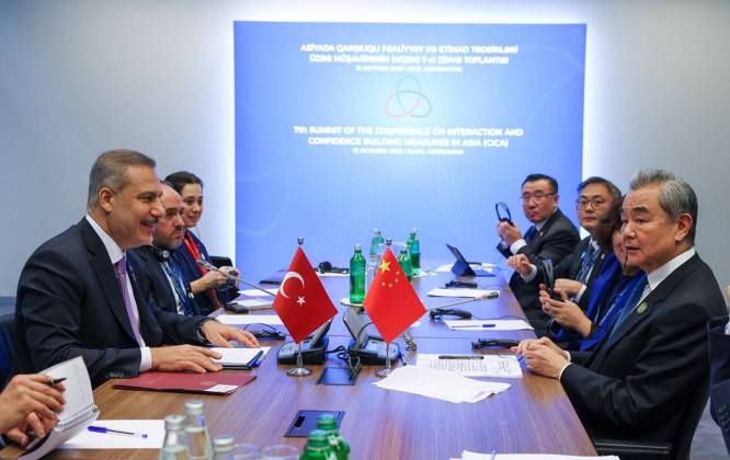 Turkish Foreign Minister Hakan Fidan addresses CICA summit in Baku BAKU, AZERBAIJAN - OCTOBER 15: (----EDITORIAL USE ONLY - MANDATORY CREDIT - ‘TURKISH MINISTRY OF FOREIGN AFFAIRS HANDOUT - NO MARKETING NO ADVERTISING CAMPAIGNS - DISTRIBUTED AS A SERVICE TO CLIENTS----) Turkish Foreign Minister Hakan Fidan (L) meets with Chinese Foreign Minister Wang Yi (R) on the sidelines of the 7th CICA Summit in Baku, Azerbaijan, on October 15, 2026. Turkish Foreign Ministry Handout Anadolu Baku Azerbaijan. Editorial use only. Please get in touch for any other usage.  Copyright: x2026xAnadoluxTurkishxForeignxMinistry Handoutx