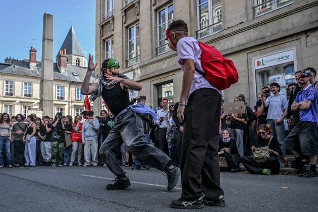 HIGH SCHOOL STUDENTS’ PROTEST PHOTOPQR OUEST FRANCE Martin ROCHE Caen October 15, 2026 On Thursday, October 15, 2026, about 400 people protested in the streets of Caen, Calvados. The demonstration was organized by the General Assembly of National Education staff, supported by union members, high school students, and college students—here, high school students are staging a light battle. Photographer Martin ROCHE, Ouest France, France. Fires have broken out at several schools in France as students protest by blockading educational institutions nationwide over school funding and learning conditions. Caen, FRANCE, France  Copyright: xPHOTOPQR OUESTxFRANCE MAXPPPxMartinxROCHEx 20261015OFR0446 20261015OFR0446