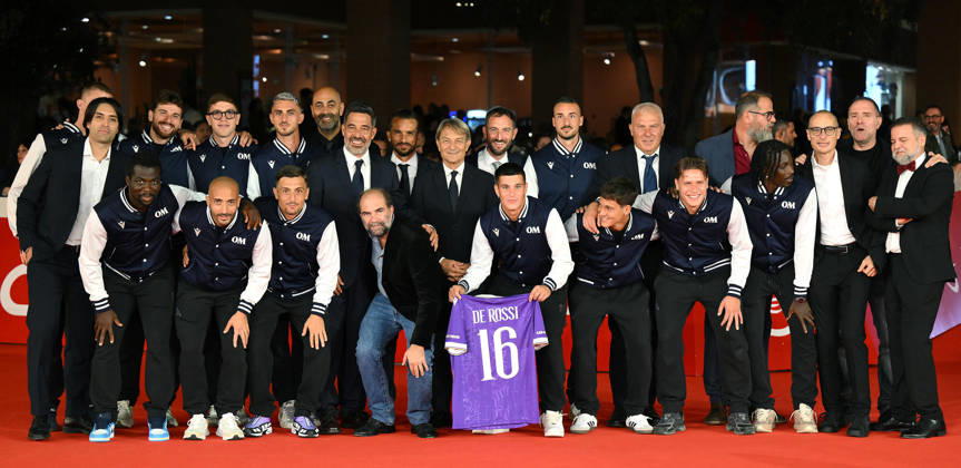 October 15, 2026, Rome, ITALY: Ostiamare soccer players, Italian director Nicola Rafele Ravera (C-L), Alberto De Rossi (C) with the crew arrive for the screening of the series Radici™ at the 21st annual Rome International Film Festival in Rome, Italy, 15 October 2026. The Festa del Cinema di Roma runs from 13 to 25 October 2026. ANSA ETTORE FERRARI. Rome ITALY  - ZUMAa110 20261015_zaf_a110_047 Copyright: xEttorexFerrarix