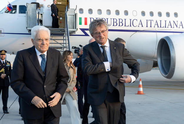 October 15, 2026, Lubiana, Slovenia: A handout picture, provided by Quirinale Press Office, shows President Sergio Mattarella (L) welcomed by the Italian Ambassador to Ljubljana, Giuseppe Cavagna, upon his arrival at JoÅ¾e Pu?nik Airport on the occasion of his participation in the 21st Meeting of the Heads of State of the Arraiolos Group, Ljubljana, 15 October 2026. ANSA Office +++ ANSA PROVIDES ACCESS TO THIS HANDOUT PHOTO TO BE USED SOLELY TO ILLUSTRATE NEWS REPORTING OR COMMENTARY ON THE FACTS OR EVENTS DEPICTED IN THIS IMAGE - NO ARCHIVING - NO LICENSING - NPK Lubiana Slovenia  - ZUMAa110 20261015_zaf_a110_054 Copyright: xPaoloxGiandotti QuirinalexPressx