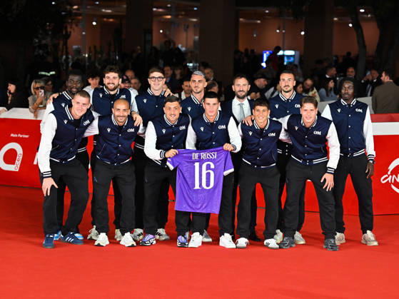 IPA89726222 - Rome, 2026 Film Festival Night 3 Red Carpet for the film Radici. Pictured: the Ostiamare Lido Calcio soccer team  Copyright: xMaurizioxD Avanzox xPoolxRomaxFilmxFestx2026x IPA89726222