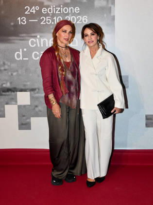 IPA89727905 - Roma Cinema Fest 2026. Night 3 Red Carpet for the film Idda. Pictured: Elena Sofia Ricci, Elisa Barucchieri (Elena Sofia Ricci™s sister)  Copyright: xVincenzoxLandix xPoolxRomaxFilmxFestx2026x IPA89727905