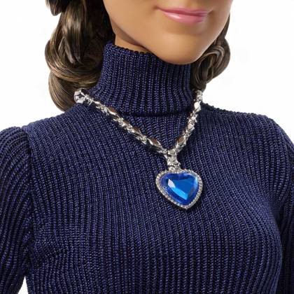 Céline Dion gets her own Barbie doll based on her 1998 Oscars look Céline Dion gets her own Barbie doll based on her 1998 Oscars look., , Toymaker Mattel has announced the legendary Canadian singer is being honored with a Barbie Signature doll., , Céline’s doll wears a long-sleeve navy-blue gown and a necklace inspired by the blue heart-shaped diamond necklace, capturing her look as My Heart Will Go On from movie blockbuster Titanic won Best Original Song at the 1998 Academy Awards., , Céline said: It is a true honor to join the Barbie legacy with a doll inspired by one of the most meaningful moments of my career., , I hope this doll inspires everyone to express themselves with confidence, follow their dreams and believe in the power of  Copyright: xThexMegaxAgencyxMattelxInc Megax