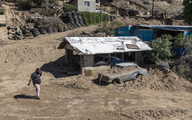 Tropical Storm Rachel leaves deadly flooding and damage in Ensen ENSENADA, MEXICO - OCTOBER 15: Homes and vehicles in the San Fernando community of Maneadero remain buried under a sand landslide triggered by Tropical Storm Rachel in Ensenada, Baja California, Mexico, on October 15, 2026. As local residents initiate cleanup and recovery efforts, authorities confirmed that the storm has claimed at least nine lives, with search operations still ongoing for one missing person. Omar Martinez Anadolu Ensenada Mexico. Editorial use only. Please get in touch for any other usage.  Copyright: x2026xAnadoluxOmarxMartinezx