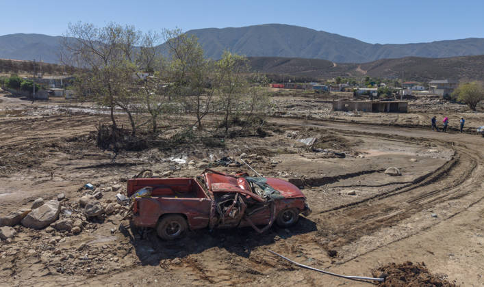 Tropical Storm Rachel leaves deadly flooding and damage in Ensen ENSENADA, MEXICO - OCTOBER 15: Rising river waters triggered by Tropical Storm Rachel flood homes and leave several structures buried under mud and debris in the Lomas de Mendoza community of Ensenada, Baja California, Mexico, on October 15, 2026. The storm damaged roadways and swept away vehicles across the region, claiming at least nine lives while search and rescue teams continue working to locate missing residents. Omar Martinez Anadolu Ensenada Mexico. Editorial use only. Please get in touch for any other usage.  Copyright: x2026xAnadoluxOmarxMartinezx
