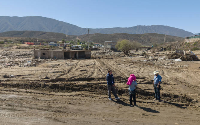 Tropical Storm Rachel leaves deadly flooding and damage in Ensen ENSENADA, MEXICO - OCTOBER 15: Rising river waters triggered by Tropical Storm Rachel flood homes and leave several structures buried under mud and debris in the Lomas de Mendoza community of Ensenada, Baja California, Mexico, on October 15, 2026. The storm damaged roadways and swept away vehicles across the region, claiming at least nine lives while search and rescue teams continue working to locate missing residents. Omar Martinez Anadolu Ensenada Mexico. Editorial use only. Please get in touch for any other usage.  Copyright: x2026xAnadoluxOmarxMartinezx