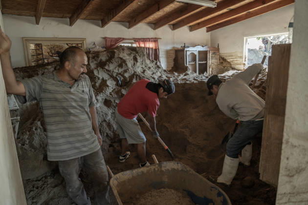 Tropical Storm Rachel leaves deadly flooding and damage in Ensen ENSENADA, MEXICO - OCTOBER 15: Residents of the Maneadero community clean mud and debris from their flooded homes following severe damage caused by Tropical Storm Rachel in Ensenada, Baja California, Mexico, on October 15, 2026. The storm damaged roadways and swept away vehicles across the region, claiming at least nine lives while search teams continue efforts to locate one missing person. Omar Martinez Anadolu Ensenada Mexico. Editorial use only. Please get in touch for any other usage.  Copyright: x2026xAnadoluxOmarxMartinezx