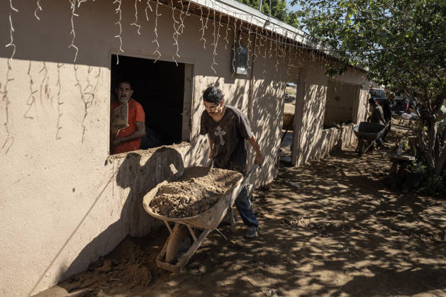 Tropical Storm Rachel leaves deadly flooding and damage in Ensen ENSENADA, MEXICO - OCTOBER 15: Residents of the Maneadero community clean mud and debris from their flooded homes following severe damage caused by Tropical Storm Rachel in Ensenada, Baja California, Mexico, on October 15, 2026. The storm damaged roadways and swept away vehicles across the region, claiming at least nine lives while search teams continue efforts to locate one missing person. Omar Martinez Anadolu Ensenada Mexico. Editorial use only. Please get in touch for any other usage.  Copyright: x2026xAnadoluxOmarxMartinezx