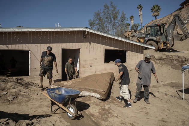 Tropical Storm Rachel leaves deadly flooding and damage in Ensen ENSENADA, MEXICO - OCTOBER 15: Residents of the Maneadero community clean mud and debris from their flooded homes following severe damage caused by Tropical Storm Rachel in Ensenada, Baja California, Mexico, on October 15, 2026. The storm damaged roadways and swept away vehicles across the region, claiming at least nine lives while search teams continue efforts to locate one missing person. Omar Martinez Anadolu Ensenada Mexico. Editorial use only. Please get in touch for any other usage.  Copyright: x2026xAnadoluxOmarxMartinezx