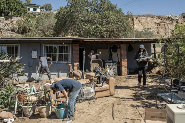 Tropical Storm Rachel leaves deadly flooding and damage in Ensen ENSENADA, MEXICO - OCTOBER 15: Residents of the Maneadero community clean mud and debris from their flooded homes following severe damage caused by Tropical Storm Rachel in Ensenada, Baja California, Mexico, on October 15, 2026. The storm damaged roadways and swept away vehicles across the region, claiming at least nine lives while search teams continue efforts to locate one missing person. Omar Martinez Anadolu Ensenada Mexico. Editorial use only. Please get in touch for any other usage.  Copyright: x2026xAnadoluxOmarxMartinezx