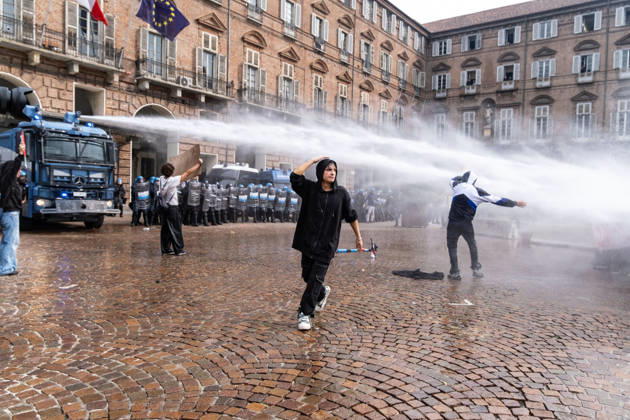 October 16, 2026, Turin, Piedmont, Italy: After days of occupations at many high schools across the city, following the French model, on Friday, October 16, in Turin, thousands of students took to the streets to protest the lack of resources in the school system and the inadequate condition of school buildings. The protesters marched through the city, stopping in front of Porta Susa, where teachers formed a human chain to separate them from the police. Lastly, in Piazza Castello, the police used water cannons and tear gas to disperse the demonstration, which had arrived outside the police headquarters. Turin Italy - ZUMAs377 20261016_znp_s377_038 Copyright: xPietroxStariccox