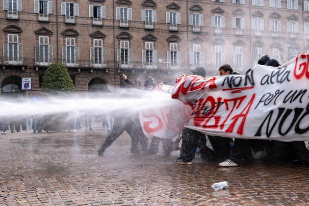 October 16, 2026, Turin, Piedmont, Italy: After days of occupations at many high schools across the city, following the French model, on Friday, October 16, in Turin, thousands of students took to the streets to protest the lack of resources in the school system and the inadequate condition of school buildings. The protesters marched through the city, stopping in front of Porta Susa, where teachers formed a human chain to separate them from the police. Lastly, in Piazza Castello, the police used water cannons and tear gas to disperse the demonstration, which had arrived outside the police headquarters. Turin Italy - ZUMAs377 20261016_znp_s377_042 Copyright: xPietroxStariccox