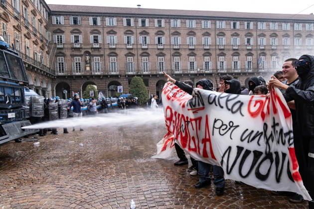 October 16, 2026, Turin, Piedmont, Italy: After days of occupations at many high schools across the city, following the French model, on Friday, October 16, in Turin, thousands of students took to the streets to protest the lack of resources in the school system and the inadequate condition of school buildings. The protesters marched through the city, stopping in front of Porta Susa, where teachers formed a human chain to separate them from the police. Lastly, in Piazza Castello, the police used water cannons and tear gas to disperse the demonstration, which had arrived outside the police headquarters. Turin Italy - ZUMAs377 20261016_znp_s377_044 Copyright: xPietroxStariccox