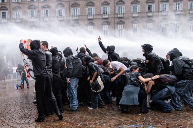 October 16, 2026, Turin, Piedmont, Italy: After days of occupations at many high schools across the city, following the French model, on Friday, October 16, in Turin, thousands of students took to the streets to protest the lack of resources in the school system and the inadequate condition of school buildings. The protesters marched through the city, stopping in front of Porta Susa, where teachers formed a human chain to separate them from the police. Lastly, in Piazza Castello, the police used water cannons and tear gas to disperse the demonstration, which had arrived outside the police headquarters. Turin Italy - ZUMAs377 20261016_znp_s377_041 Copyright: xPietroxStariccox