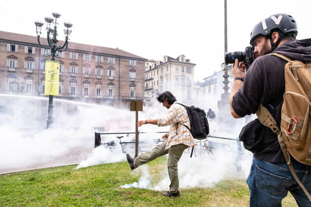 October 16, 2026, Turin, Piedmont, Italy: After days of occupations at many high schools across the city, following the French model, on Friday, October 16, in Turin, thousands of students took to the streets to protest the lack of resources in the school system and the inadequate condition of school buildings. The protesters marched through the city, stopping in front of Porta Susa, where teachers formed a human chain to separate them from the police. Lastly, in Piazza Castello, the police used water cannons and tear gas to disperse the demonstration, which had arrived outside the police headquarters. Turin Italy - ZUMAs377 20261016_znp_s377_049 Copyright: xPietroxStariccox